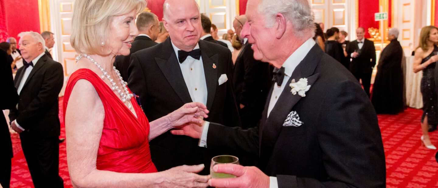 His majesty King Charles III greeting people at an event
